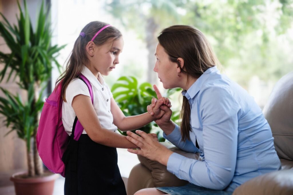 Mother listening to her child talk about school worries